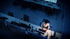 Woman working alone in office late at night